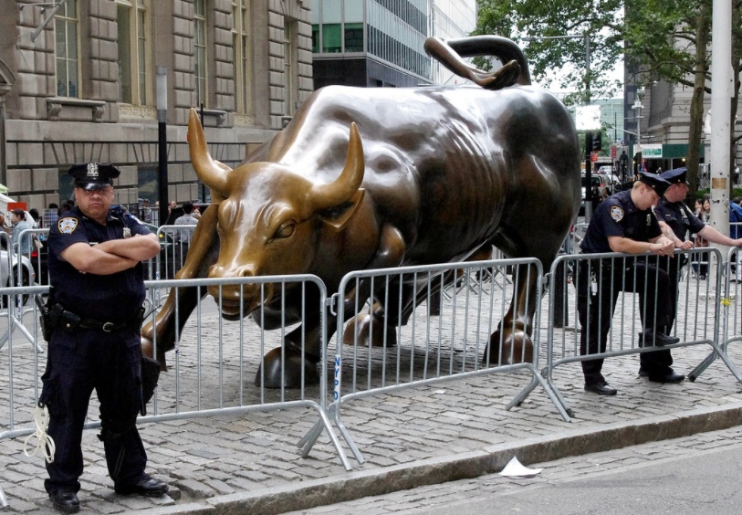 wall street charging bull police